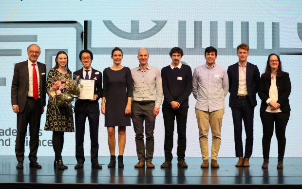 Picture of people standing on a stage